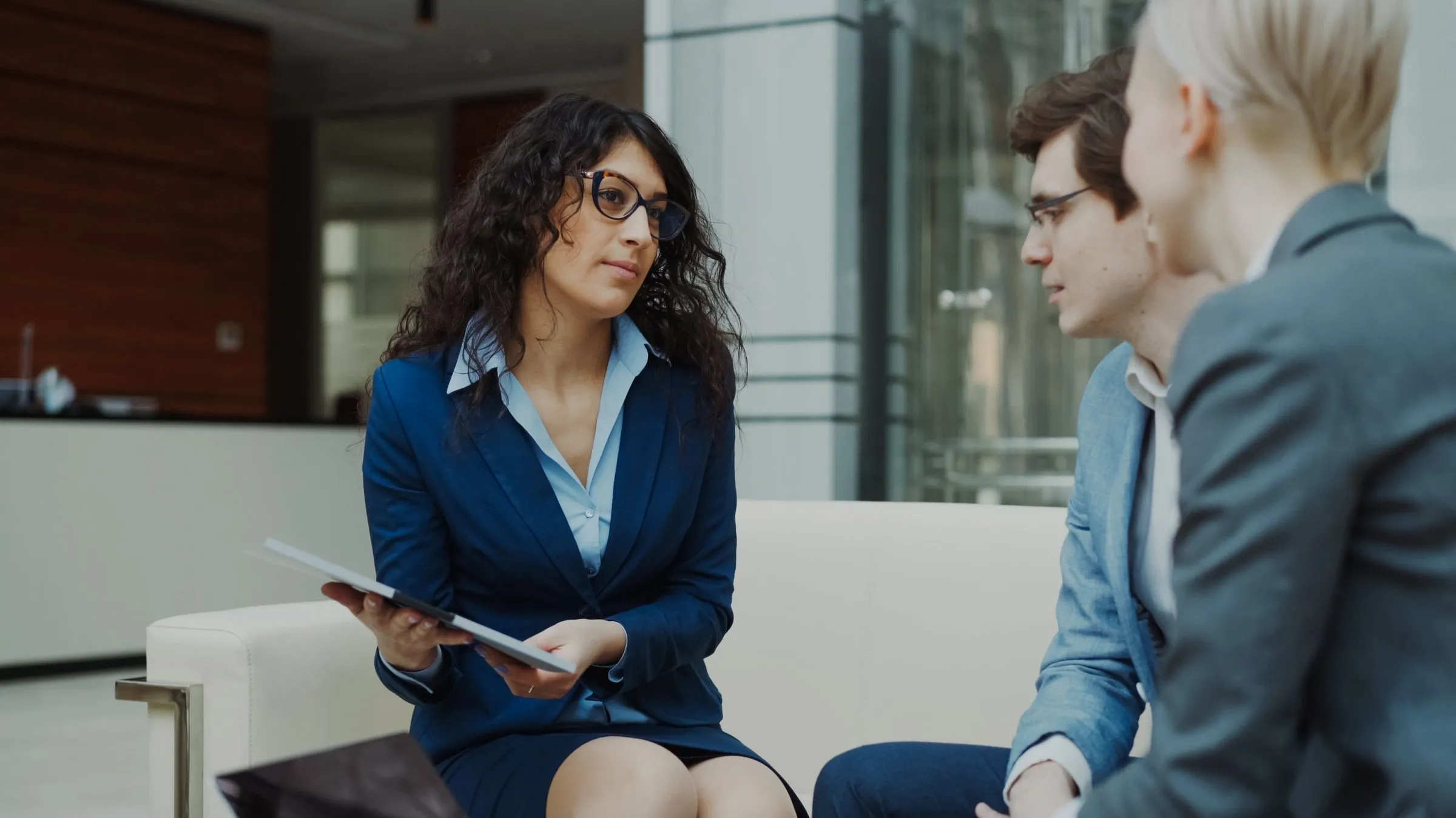 Senior leaders in a confidential boardroom discussion
