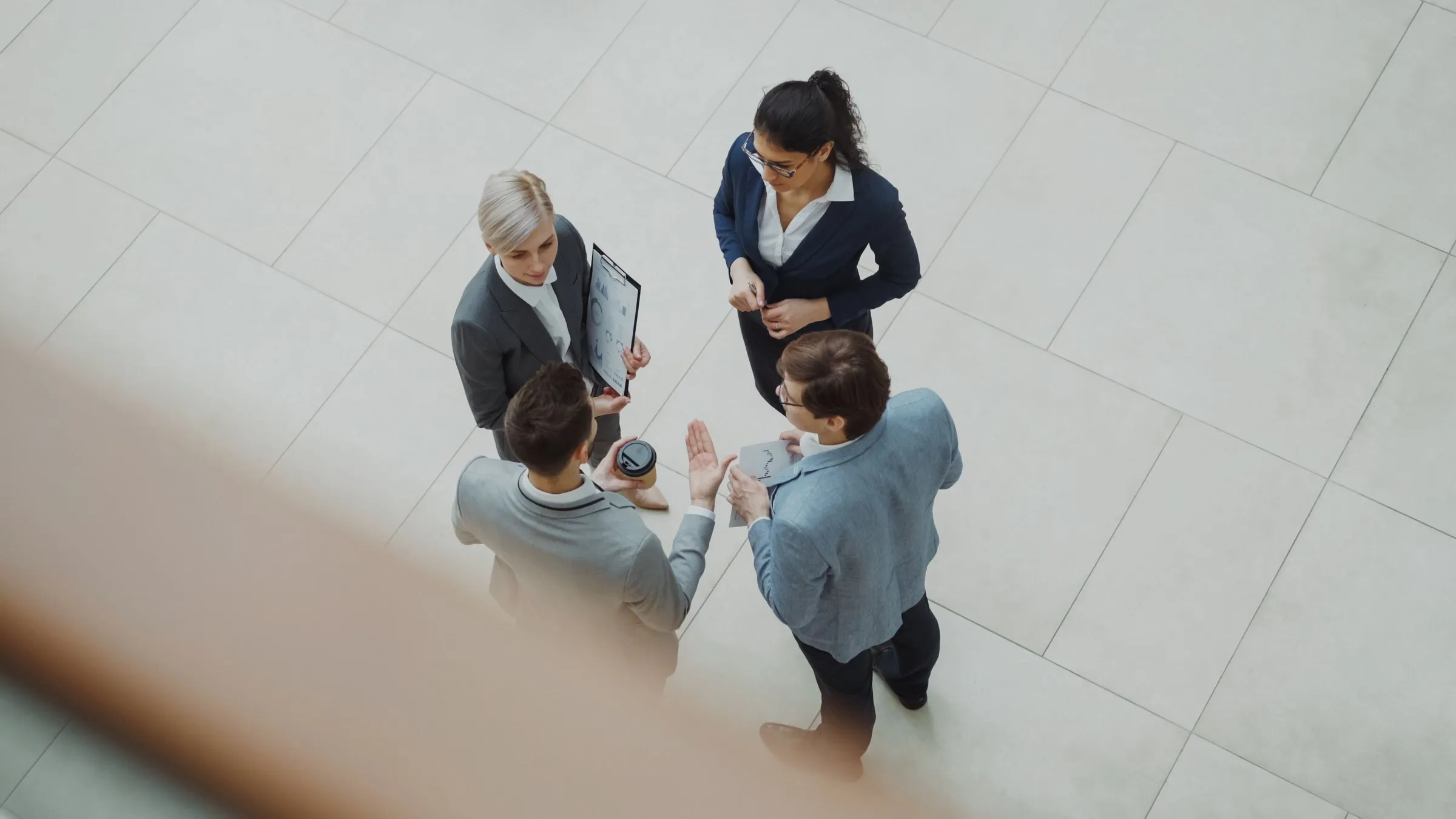 Overhead view of a management team meeting